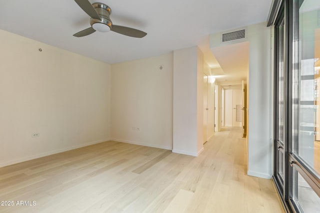4808 N 24th St Unit 923, Phoenix, AZ 85016 - spare room featuring light wood-style floors and a ceiling fan