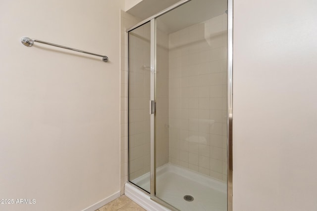 4808 N 24th St Unit 923, Phoenix, AZ 85016 - bathroom with a shower stall and tile patterned floors