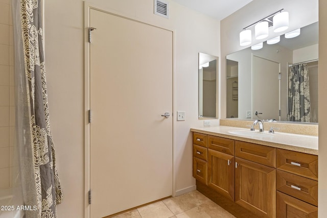 4808 N 24th St Unit 923, Phoenix, AZ 85016 - bathroom with tile patterned floors, vanity, and shower / bathtub combination with curtain