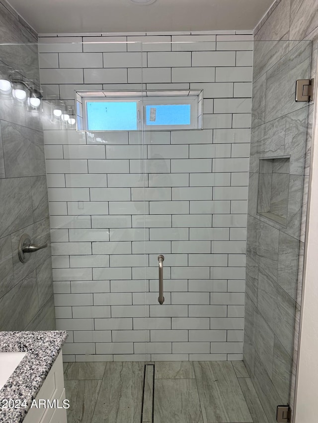 bathroom featuring vanity and walk in shower