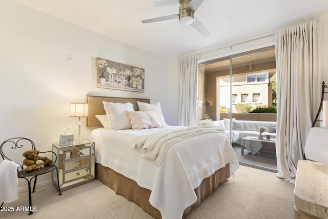 carpeted bedroom featuring access to outside and ceiling fan