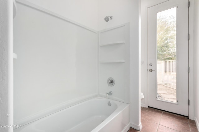 bathroom featuring tile patterned floors and shower / bath combination