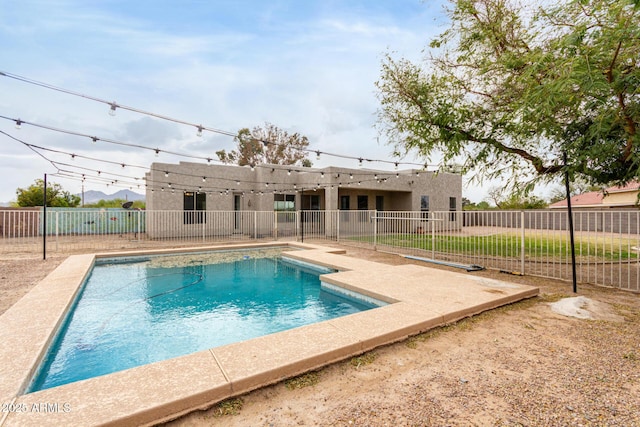view of pool with a patio, a fenced backyard, and a fenced in pool