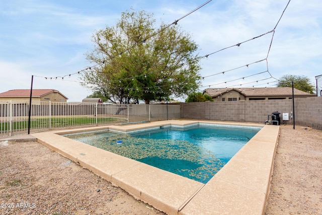 view of pool featuring a fenced backyard and a fenced in pool