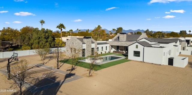 exterior space featuring a patio and a mountain view