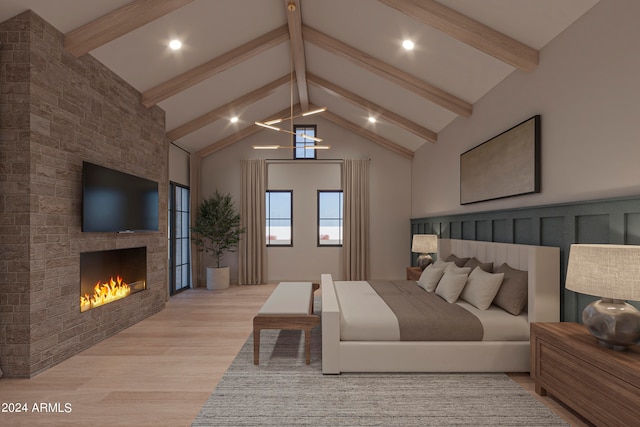 bedroom featuring beam ceiling, light hardwood / wood-style flooring, high vaulted ceiling, and a large fireplace