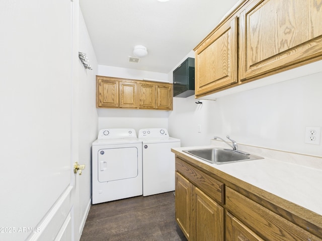 laundry area with washer and dryer and cabinet space