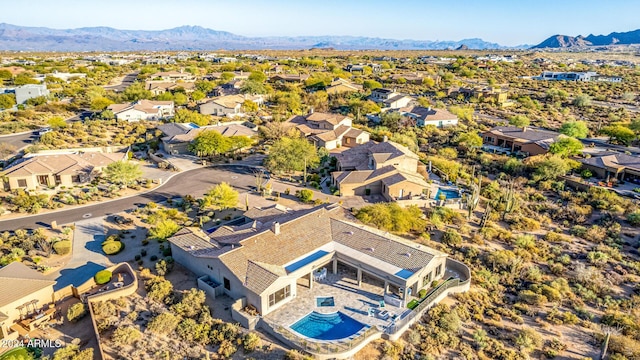 drone / aerial view featuring a mountain view