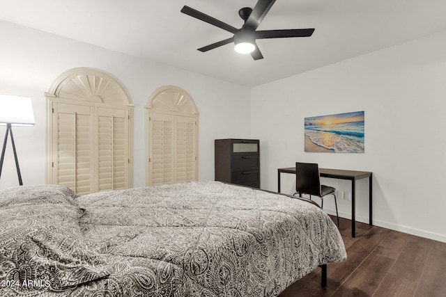 bedroom featuring dark wood-type flooring and ceiling fan