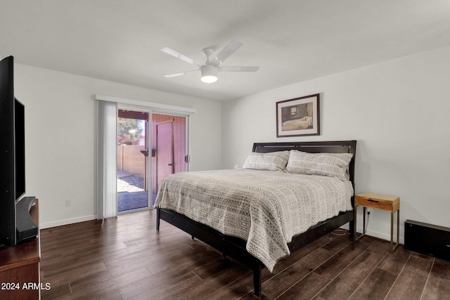 bedroom featuring dark wood-type flooring, ceiling fan, and access to exterior