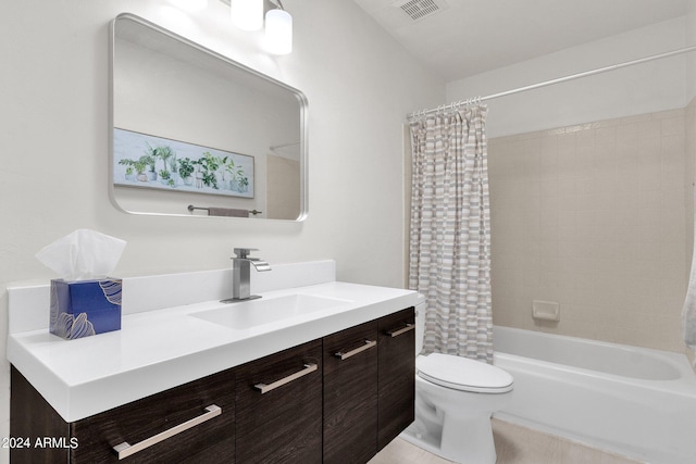 full bathroom with tile patterned floors, shower / bath combination with curtain, toilet, and vanity