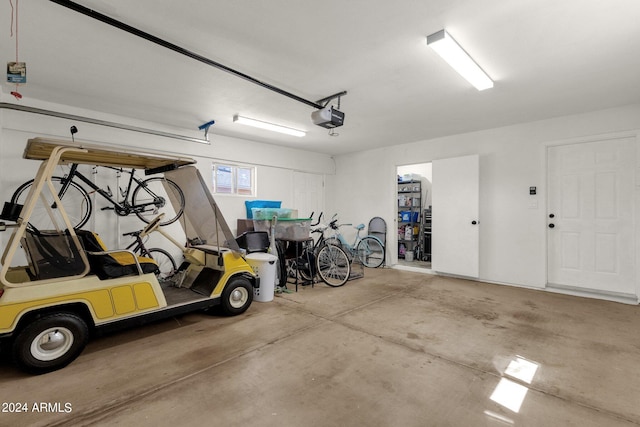 garage featuring a garage door opener