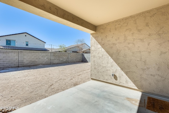 view of yard with a patio area and a fenced backyard