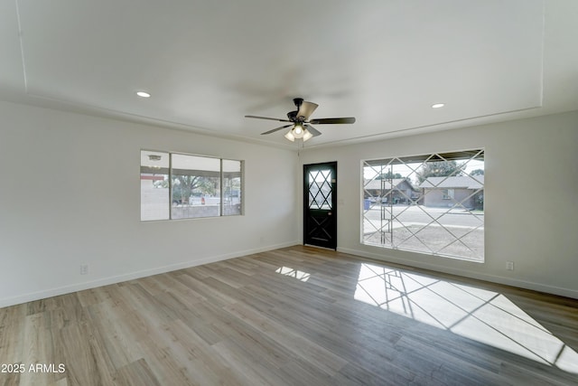 foyer entrance with recessed lighting, wood finished floors, a ceiling fan, and baseboards