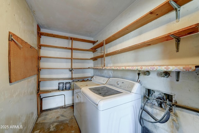 laundry room with washer and clothes dryer