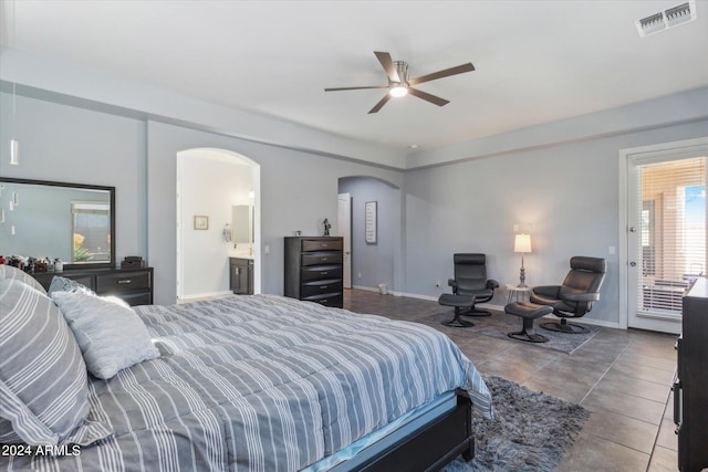 bedroom with ensuite bath, ceiling fan, access to outside, and light tile floors