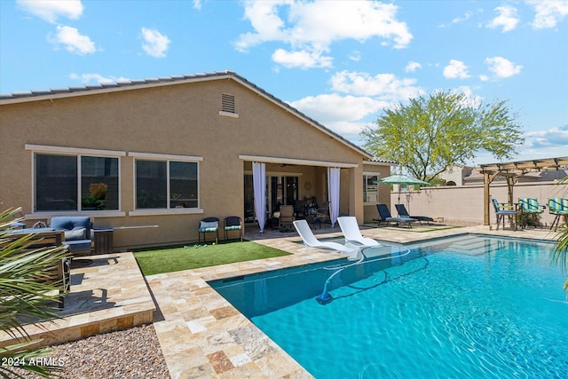 view of swimming pool featuring a patio area