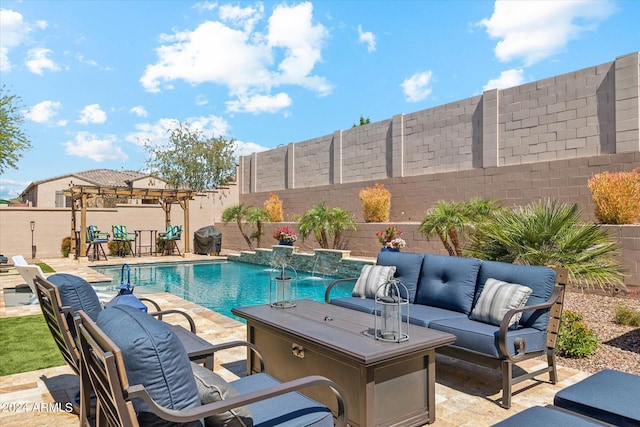 view of swimming pool with a patio and pool water feature