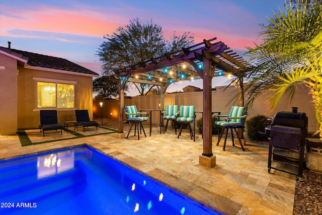 pool at dusk featuring a pergola and a patio area