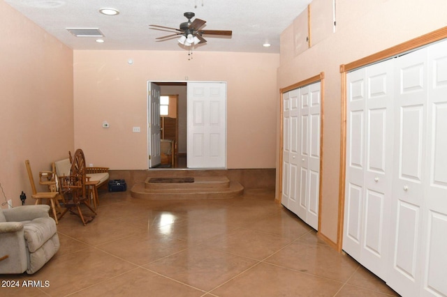 interior space featuring light tile patterned floors