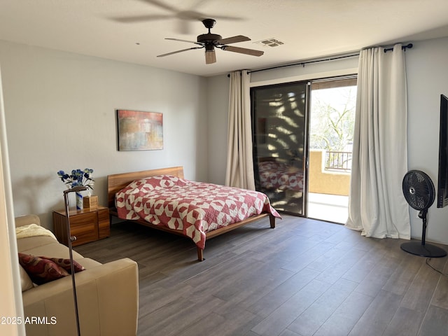 bedroom with wood-type flooring, access to outside, and ceiling fan