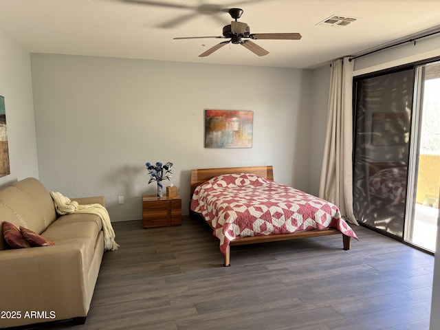 bedroom with access to outside, ceiling fan, and dark hardwood / wood-style flooring