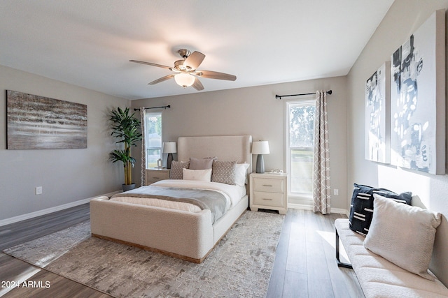 bedroom featuring hardwood / wood-style floors and ceiling fan