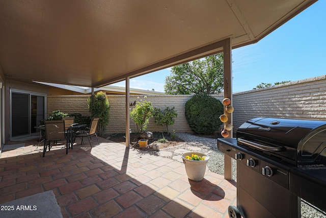 view of patio featuring a grill