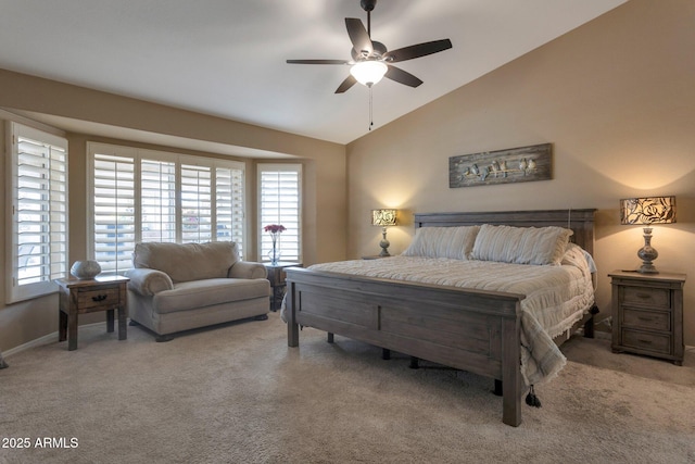 bedroom featuring vaulted ceiling, carpet flooring, a ceiling fan, and baseboards