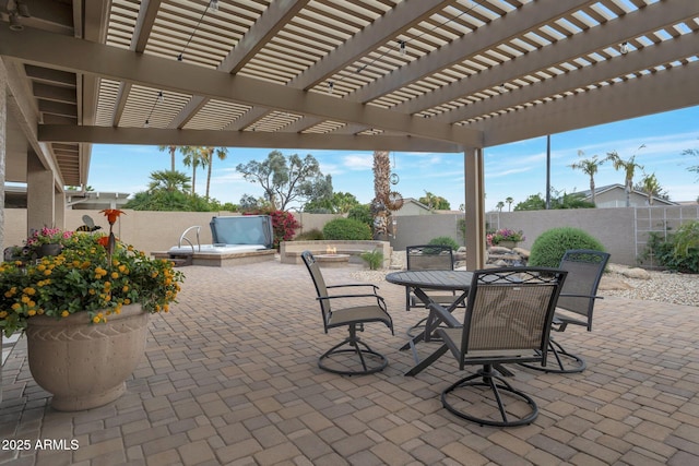 view of patio featuring a pergola, outdoor dining area, and a fenced backyard