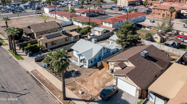 birds eye view of property with a residential view