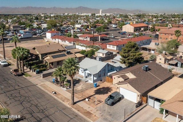 bird's eye view featuring a residential view and a mountain view