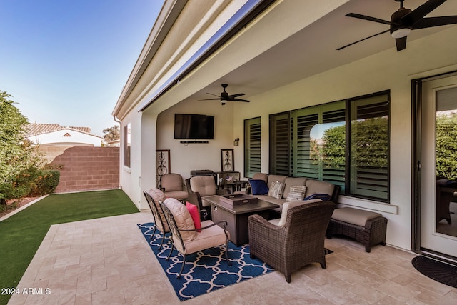 view of patio featuring outdoor lounge area and ceiling fan