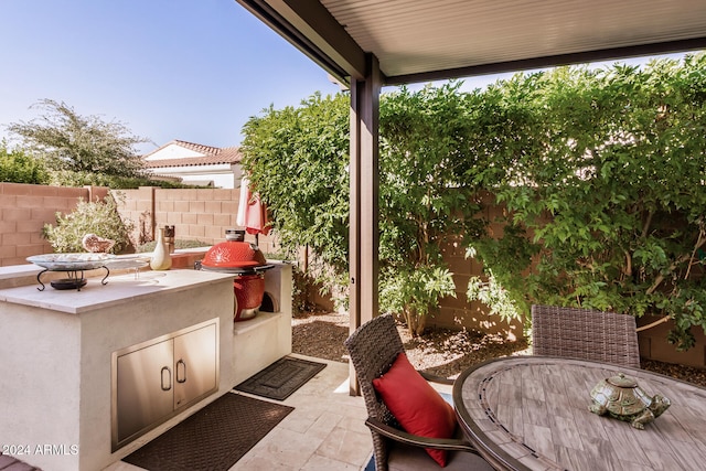 view of patio with exterior kitchen