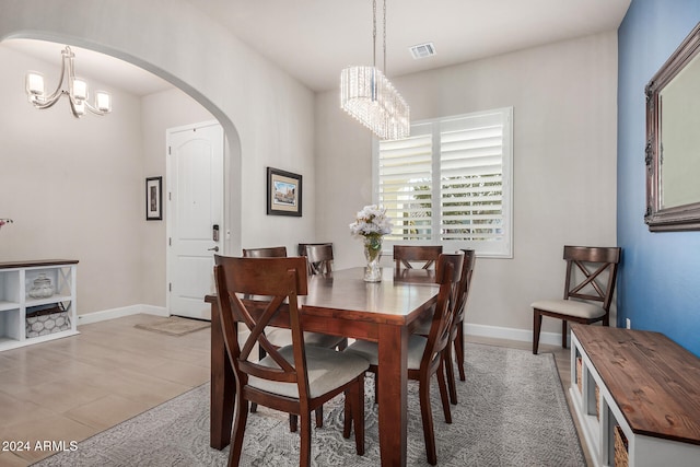 dining room featuring a chandelier