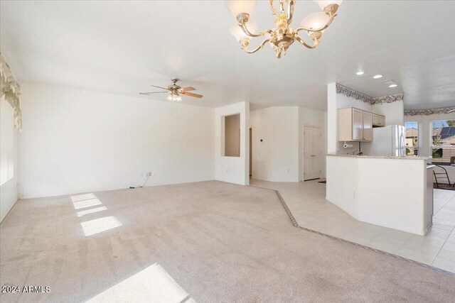 bedroom featuring ceiling fan and light colored carpet