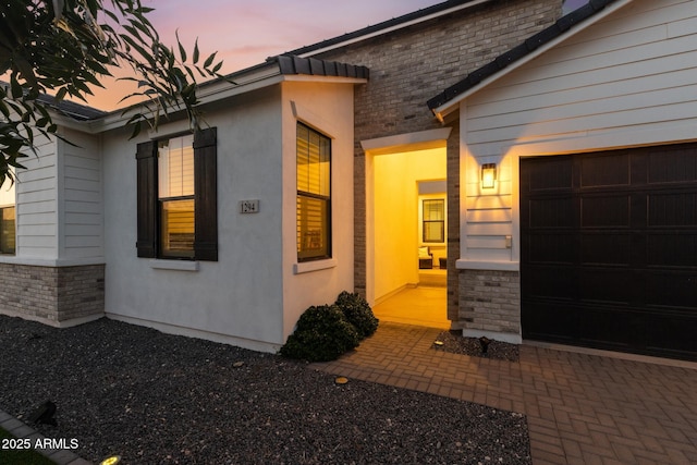 1294 E Ln Fortuna Ct, San Tan Valley, AZ 85140 - view of front of property with a garage and stone siding