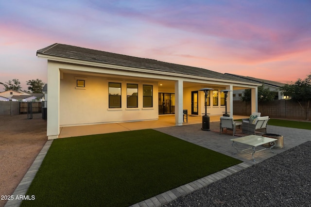 1294 E Ln Fortuna Ct, San Tan Valley, AZ 85140 - back of house featuring a fenced backyard, a patio area, and stucco siding