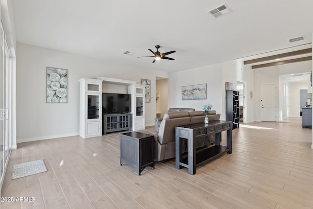 1294 E Ln Fortuna Ct, San Tan Valley, AZ 85140 - living area with ceiling fan and light wood finished floors