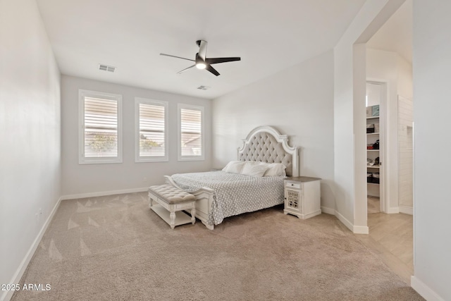 1294 E Ln Fortuna Ct, San Tan Valley, AZ 85140 - bedroom with light colored carpet and ceiling fan