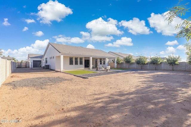 1294 E Ln Fortuna Ct, San Tan Valley, AZ 85140 - back of house featuring a fenced backyard, a patio, and stucco siding