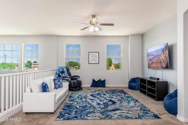 6621 S Balboa Dr, Gilbert, AZ 85298 - living area with a ceiling fan, carpet flooring, and baseboards