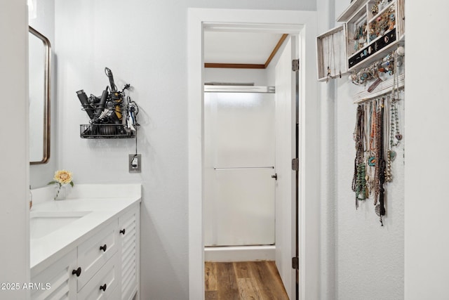 13320 N 82nd Dr, Peoria, AZ 85381 - full bathroom with wood finished floors, a shower stall, vanity, and crown molding