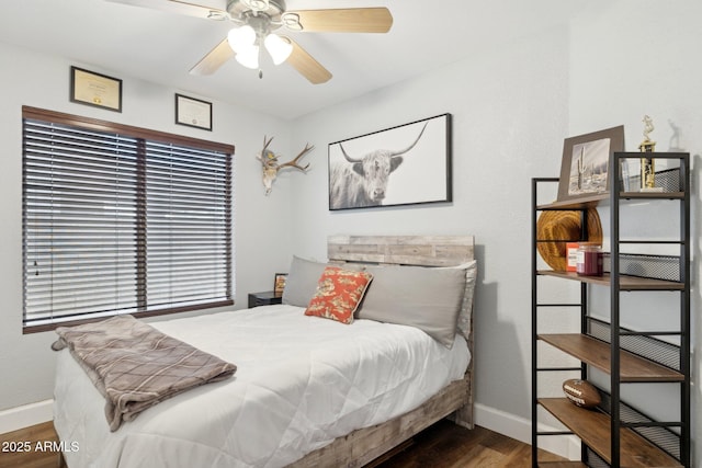 13320 N 82nd Dr, Peoria, AZ 85381 - bedroom with wood finished floors, baseboards, and a ceiling fan