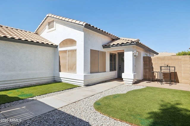 13320 N 82nd Dr, Peoria, AZ 85381 - back of house with a tiled roof and stucco siding