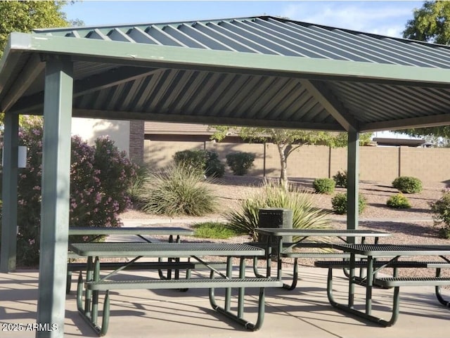 view of property's community with fence