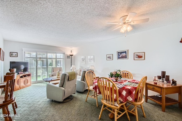 dining area with carpet, a textured ceiling, and ceiling fan