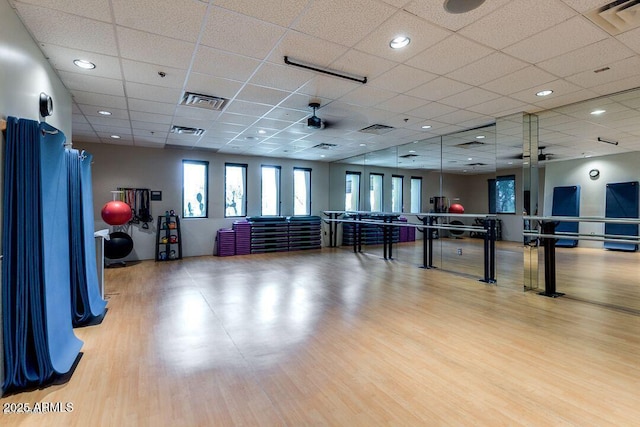 recreation room with light wood-style flooring and visible vents