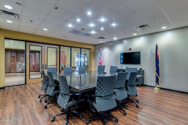 office area with wood finished floors and visible vents