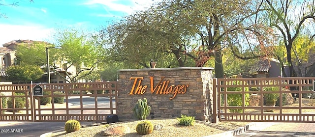 community sign with a gate